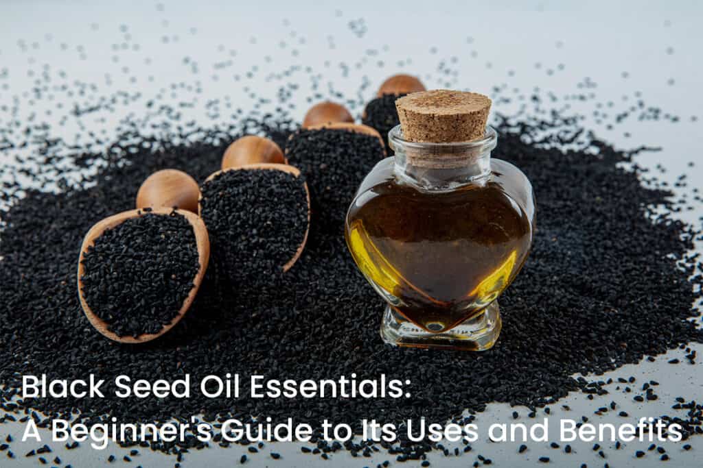 Black cumin seeds essential oil with wooden spoon or shovel on wooden background