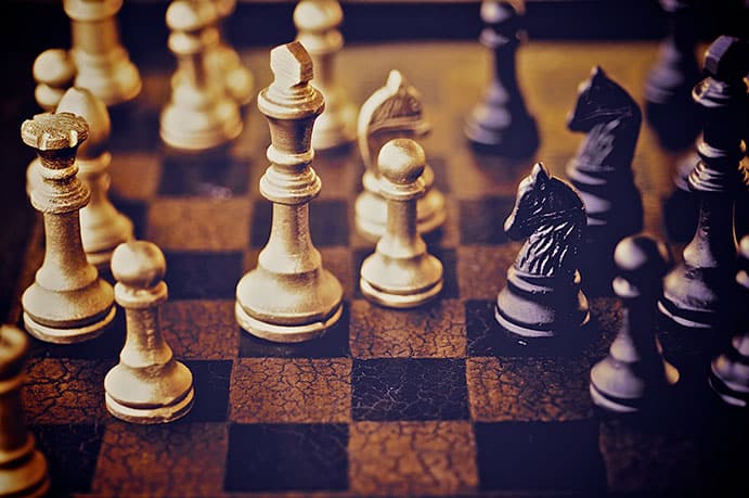 Chess piece isolated on white background advising to strategic behavior